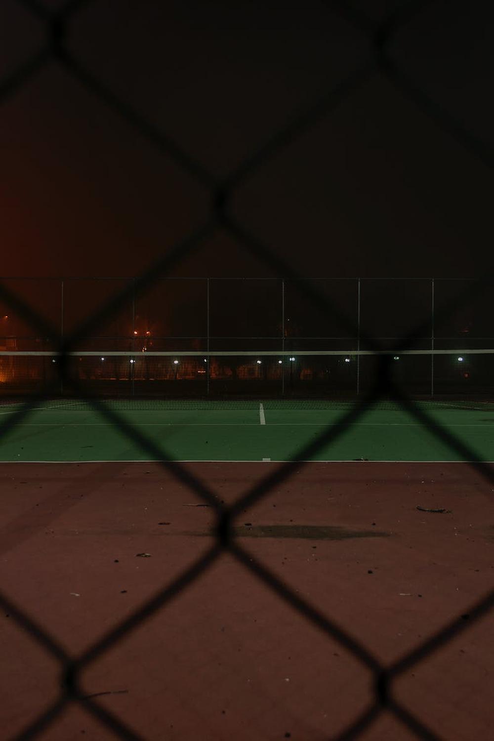 quite_tennis_field_during_nighttime